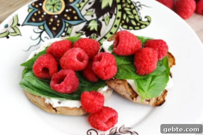 Raspberry as topping on an English muffin
