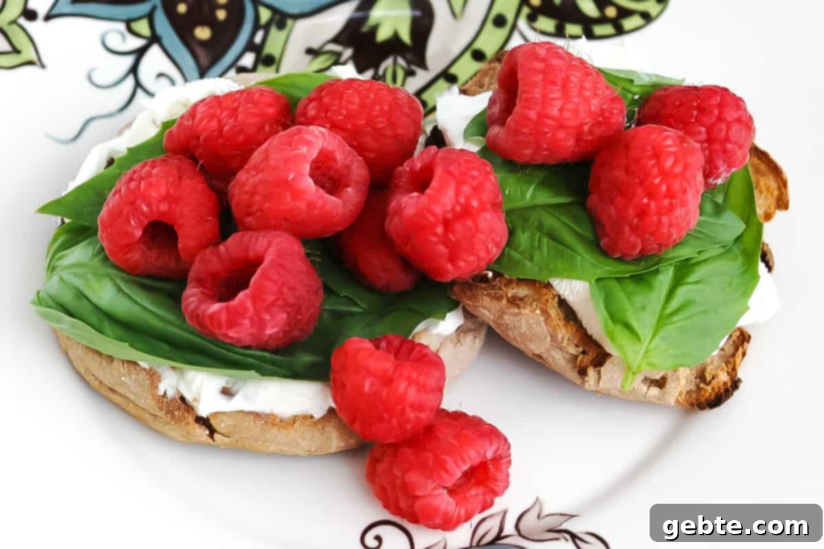 English Muffin with Raspberry, Basil, and Cream Cheese Topping