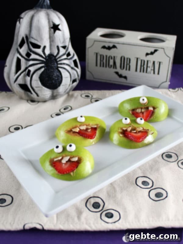 Τέρατα μήλων Halloween με φυστικοβούτυρο και σπόρους