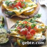 grilled vegetable tostada, fried corn tortilla, grilled zucchini, fresh tomatoes , sriracha non dairy cheese and cilantro. Summer on a plate!