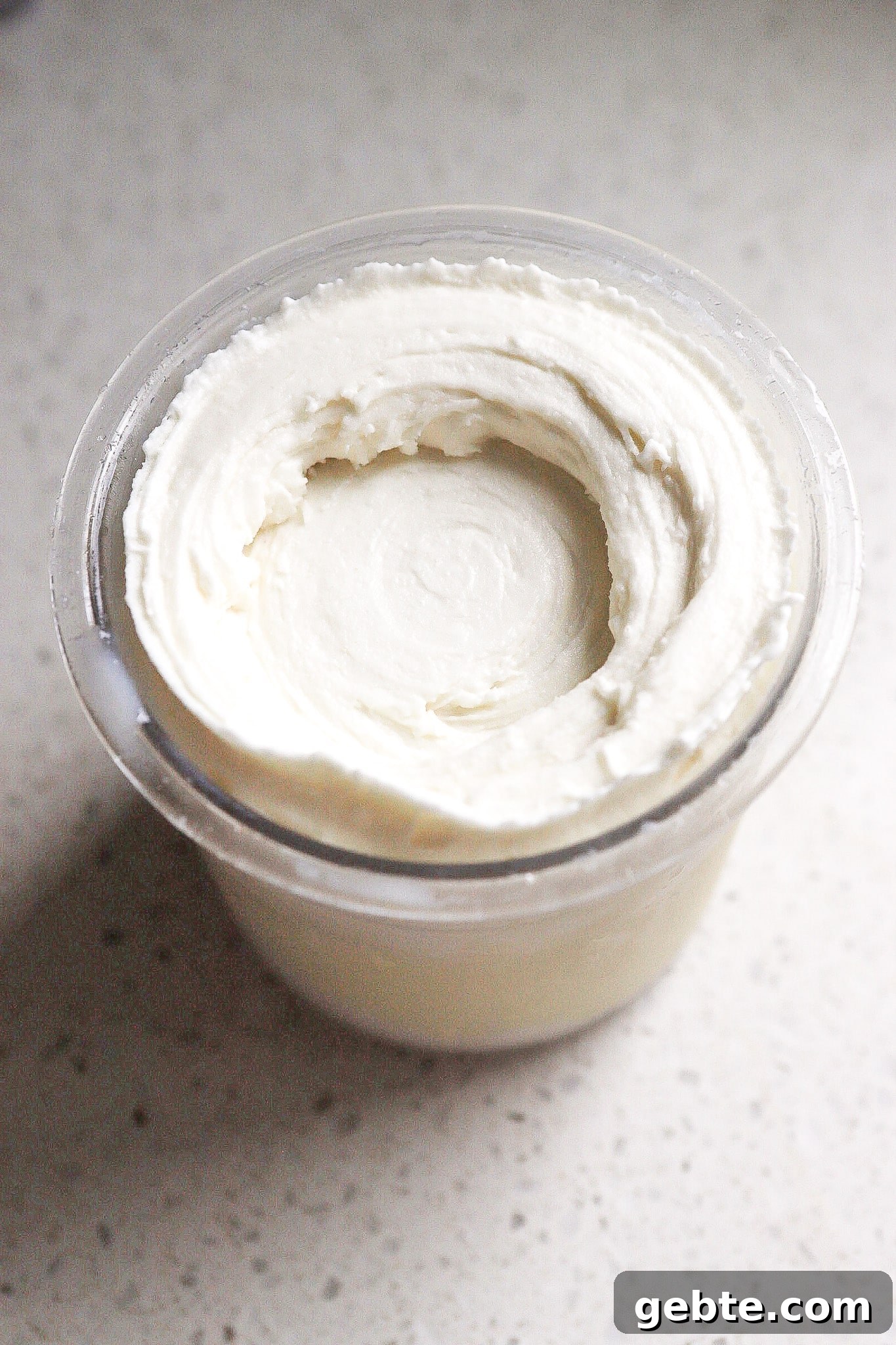 Side view of protein ninja creami ice cream in pint container.