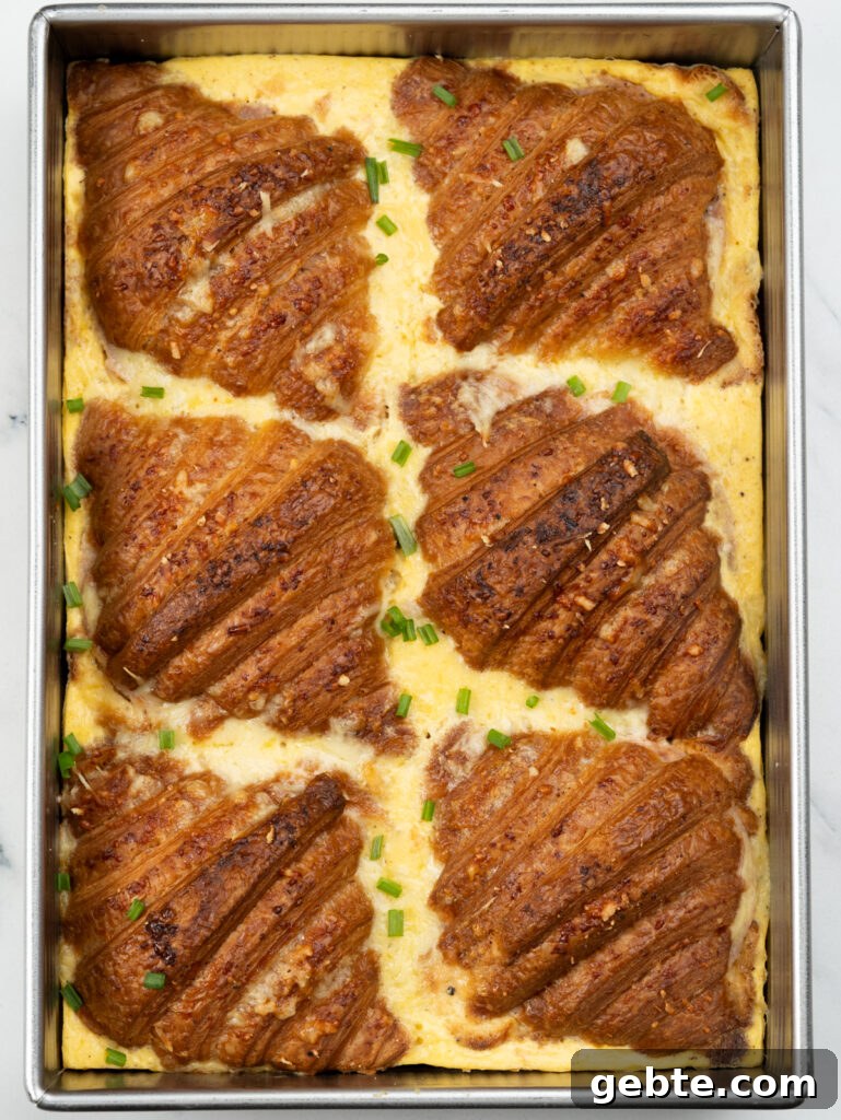 A croissant breakfast casserole brings together flaky crispy croissant and a casserole where the egg, milk, and cream bake into a custard like consistency. Easy to assemble and bake, this can also be prepped overnight.