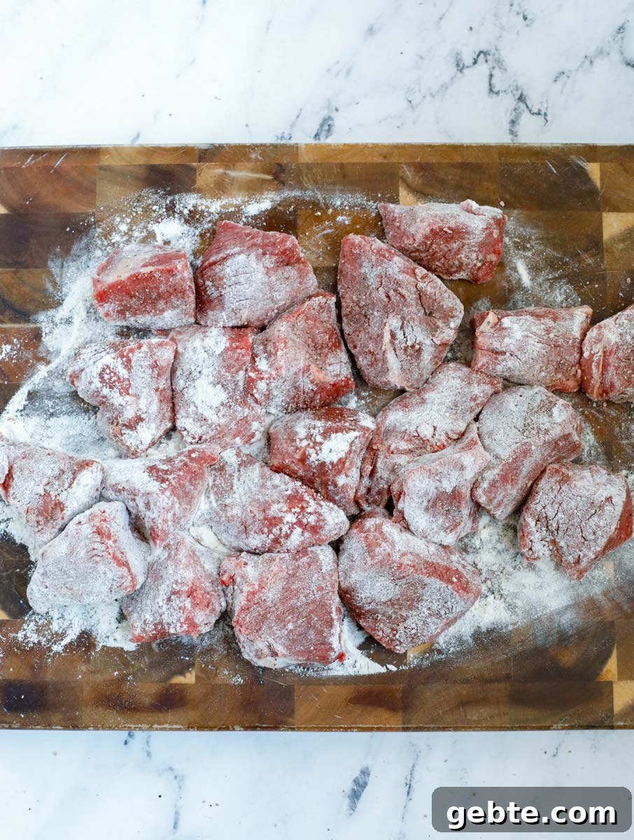 Hearty Oven-Braised Beef Stew Recipe for Comforting Dinners 4 Beef stew chuncks covered in flour.