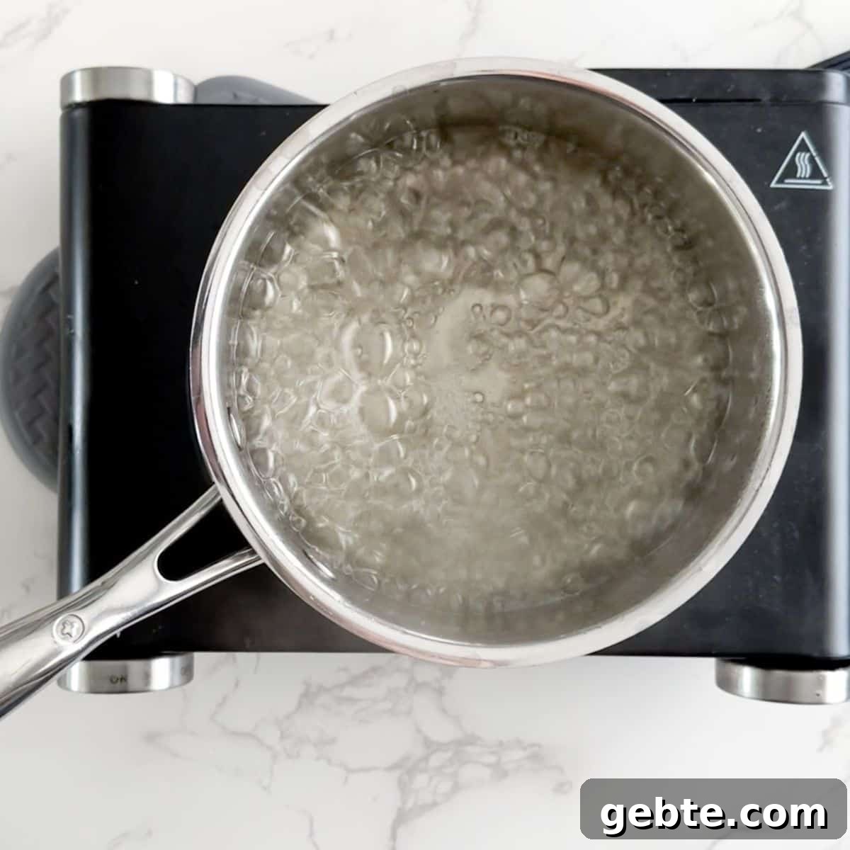 Boiling sugar water.