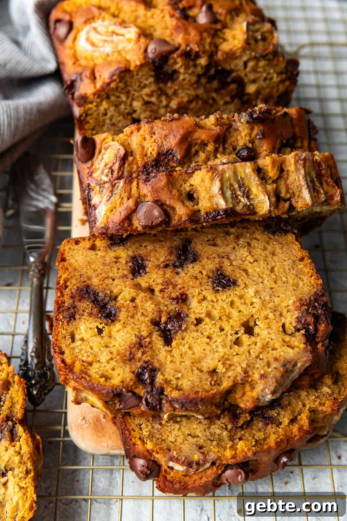 Pumpkin chocolate chip banana bread on a cutting board