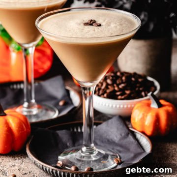 Pumpkin Spice Espresso Martini Recipe for Fall Cocktails 7 Pumpkin spice espresso martini sitting on a gray plate.