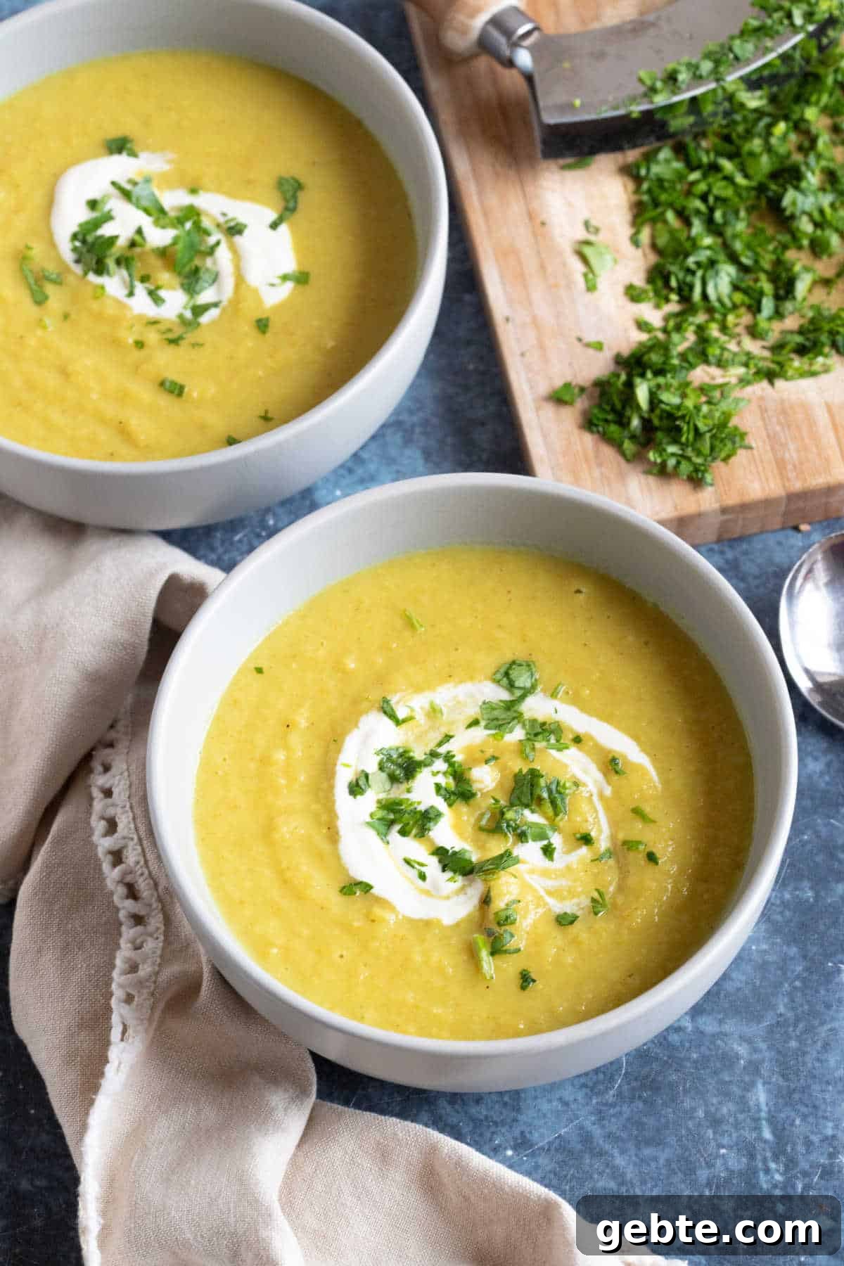 Curried Parsnip and Apple Soup Recipe for Cozy Fall Meals 2 A bowl of curried parsnip and apple soup.