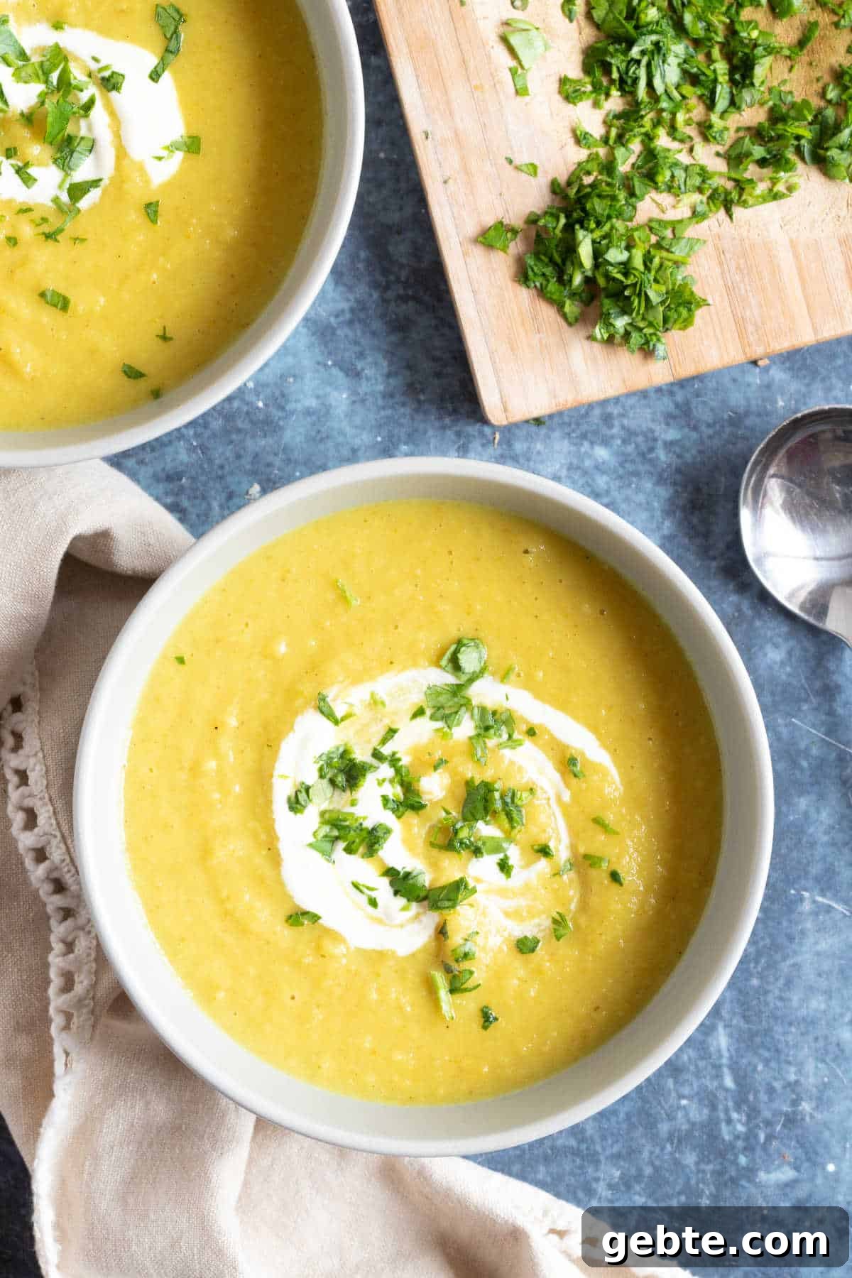 Curried Parsnip and Apple Soup Recipe for Cozy Fall Meals 5 Parsnip soup with a swirl of creme fraiche.