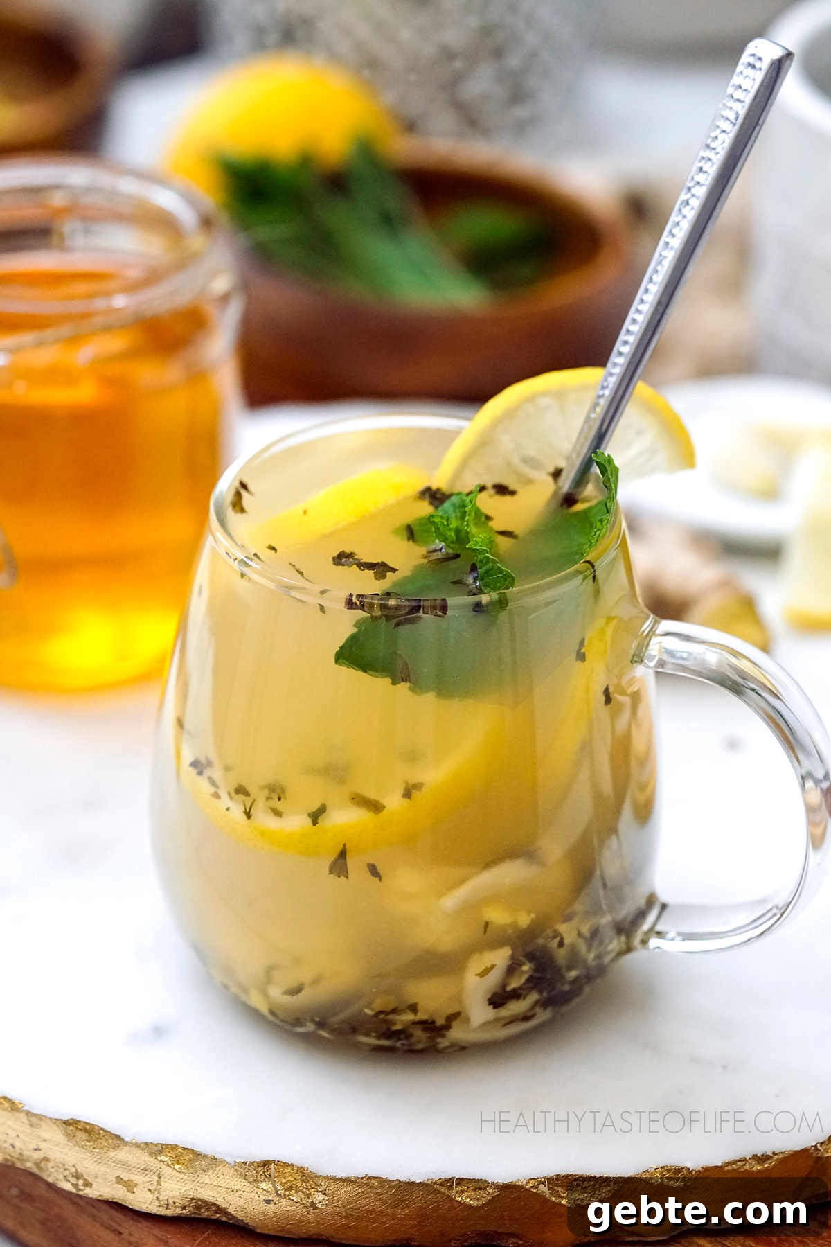 Cold & Flu Relief Drink Recipe — Soothing Winter Immune Boost 2 An immune booster drink called flu bomb drink with lemon honey ginger garlic. A cup of best tea for cold and flu.