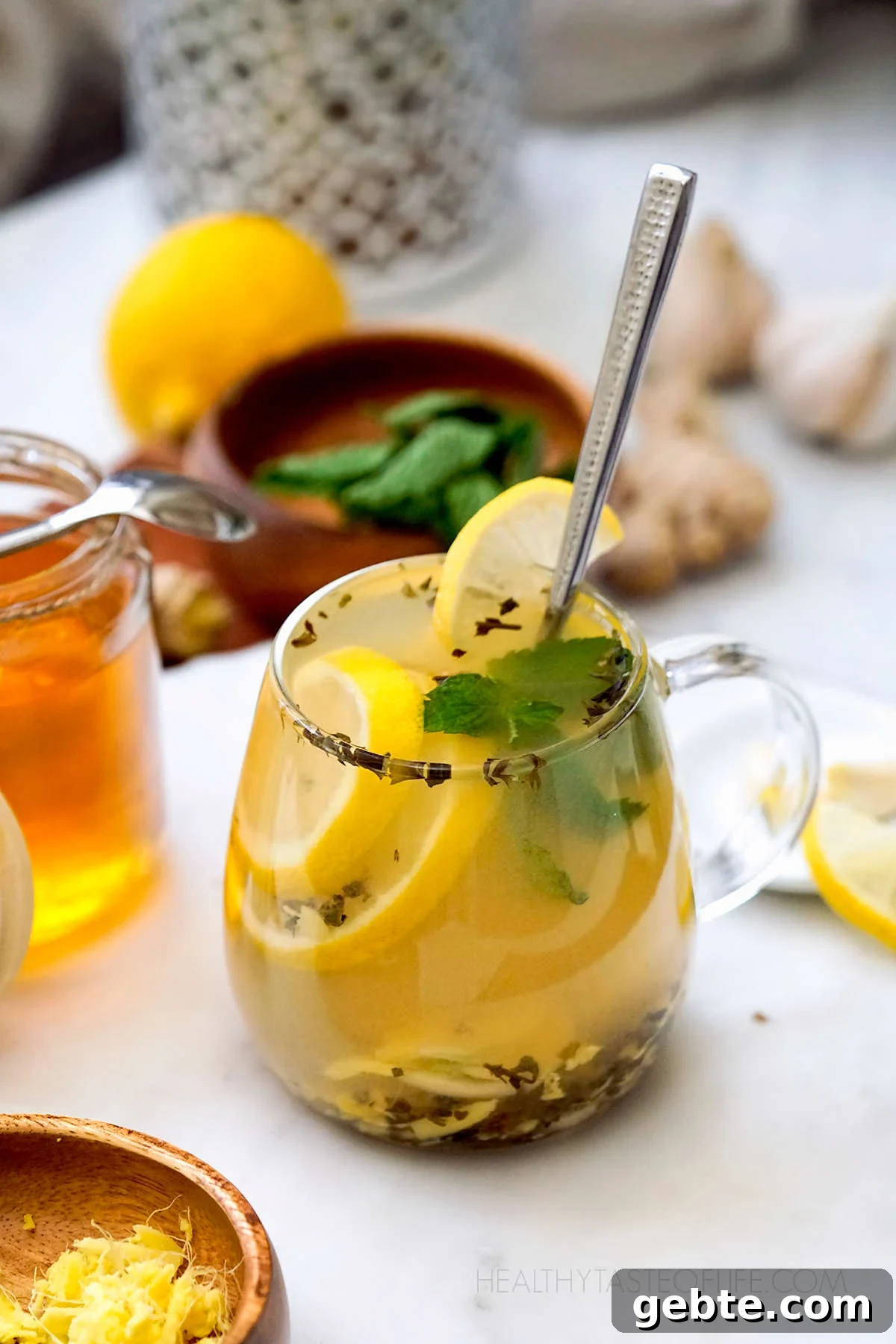 Cold & Flu Relief Drink Recipe — Soothing Winter Immune Boost 3 Lemon honey ginger garlic drink tea for flu. Home remedy for cold and flu season - herbal tea for cold and flu.