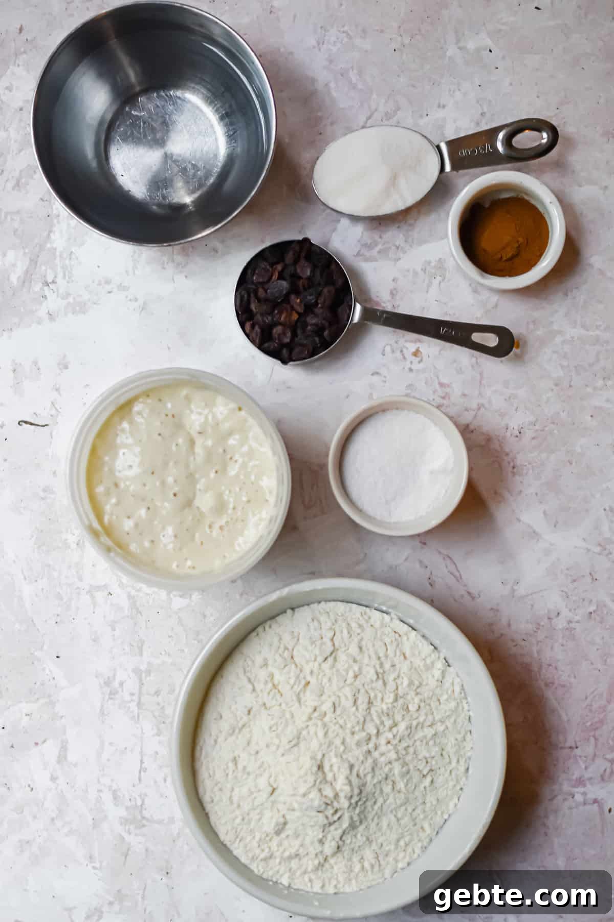 An overhead shot of the ingredients for sourdough cinnamon raisin bread