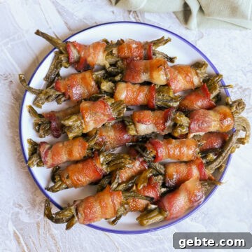 plate of bacon wrapped green bean bundles.