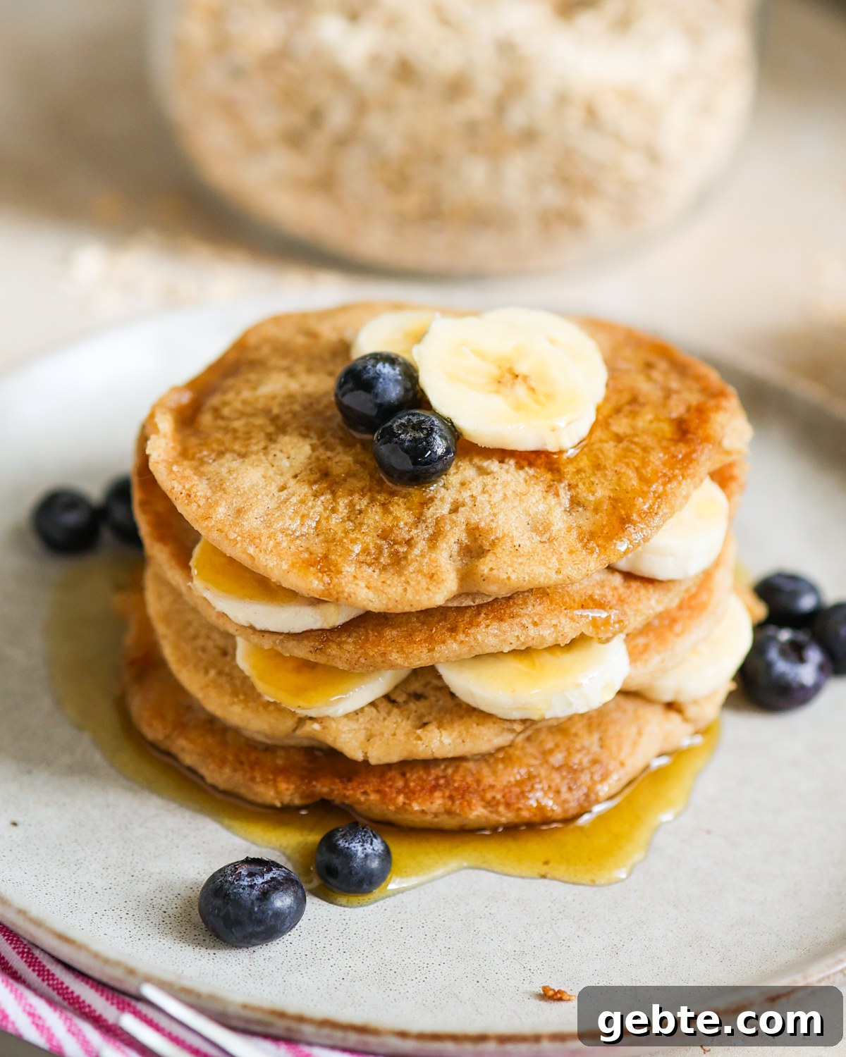 Fluffy Oat Flour Pancakes: Light, Tender Morning Stack 12 Oat flour pancakes with bananas and blueberries.