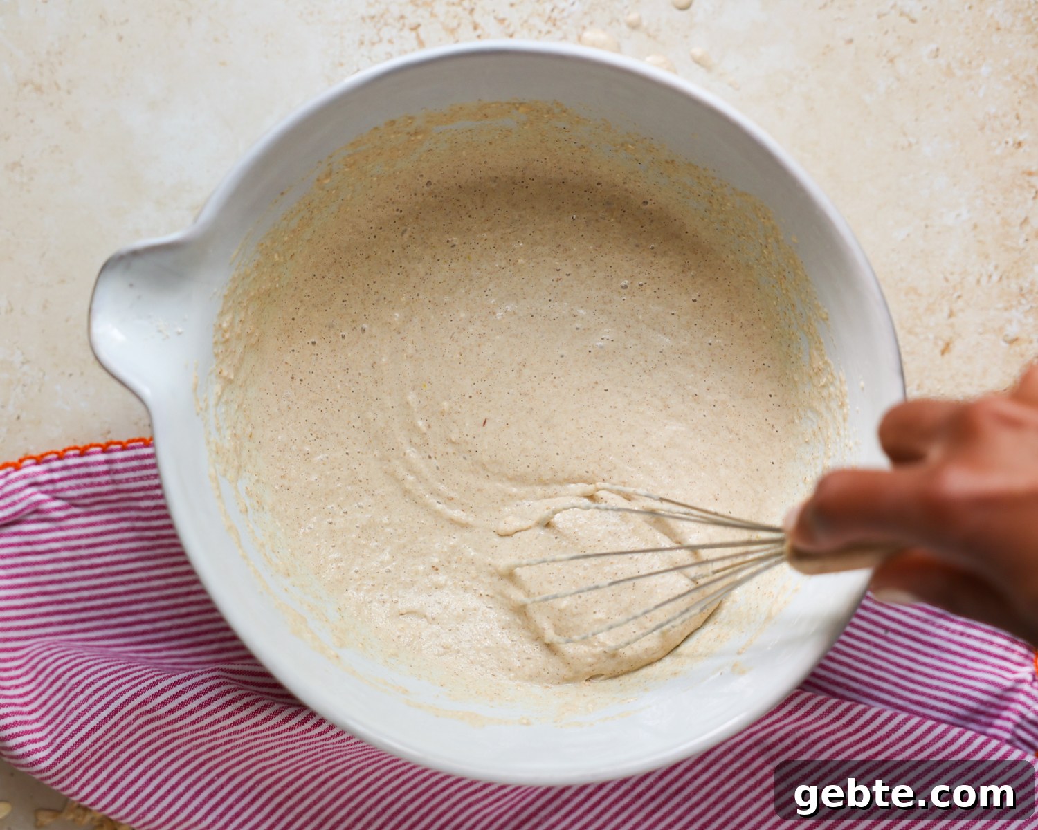 Fluffy Oat Flour Pancakes: Light, Tender Morning Stack 8 Mixing batter in a mixing bowl.