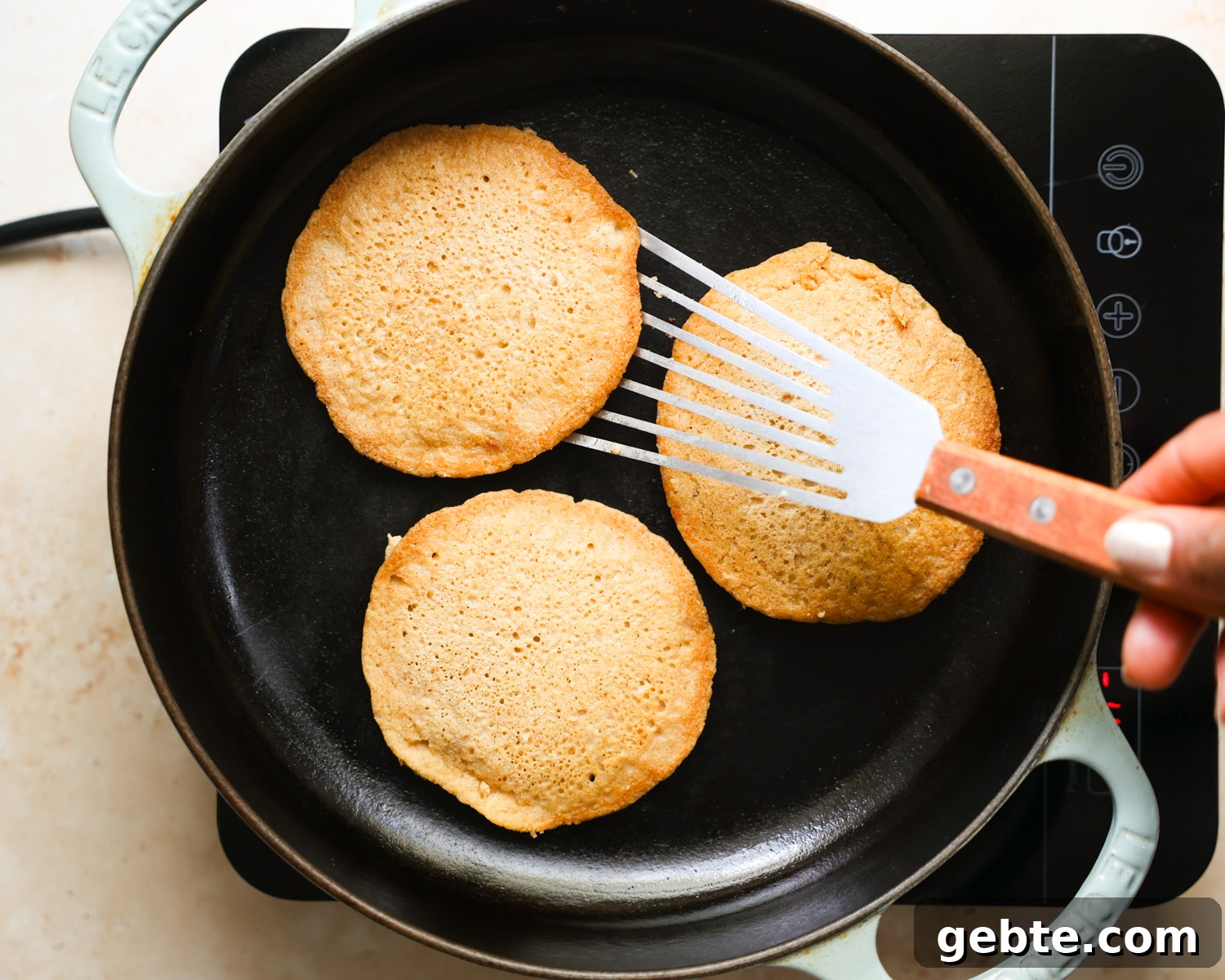Fluffy Oat Flour Pancakes: Light, Tender Morning Stack 9 Oat flour pancakes in a skillet.