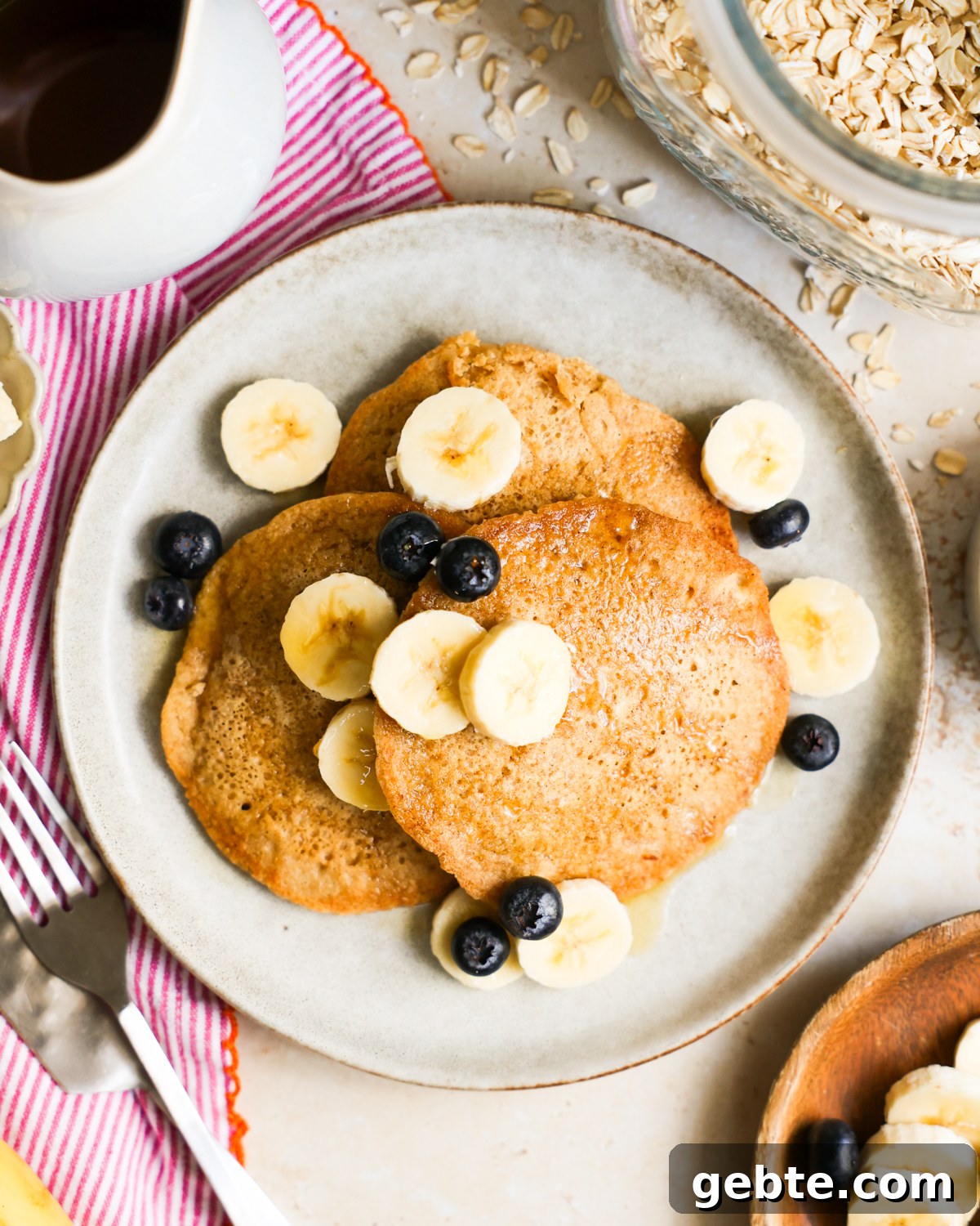 Fluffy Oat Flour Pancakes: Light, Tender Morning Stack 10 Oat flour pancakes on a plate.