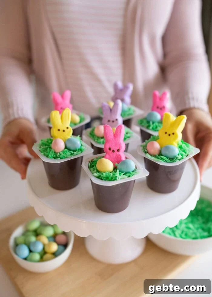 Easter bunny pudding cuts on a white cake stand.