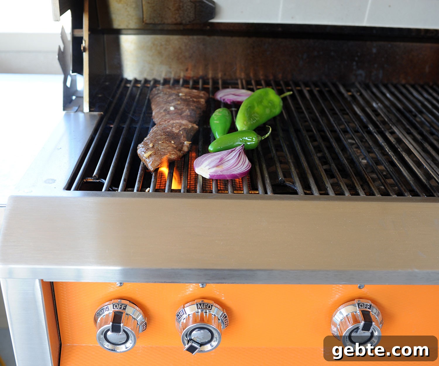 Grilled Skirt Steak Tacos with Charred Lime and Cilantro 5 flame kissing steak on grill