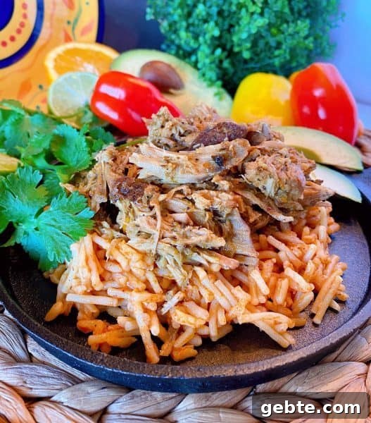 Slow Cooker Cuban Pork on Spanish Rice 