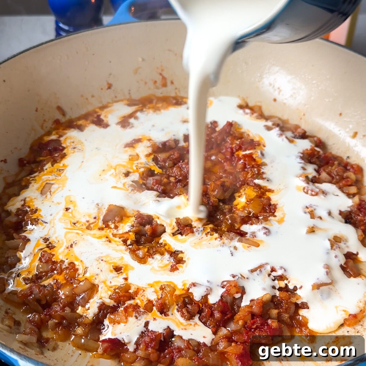 Add in the heavy cream & let the sauce thicken!