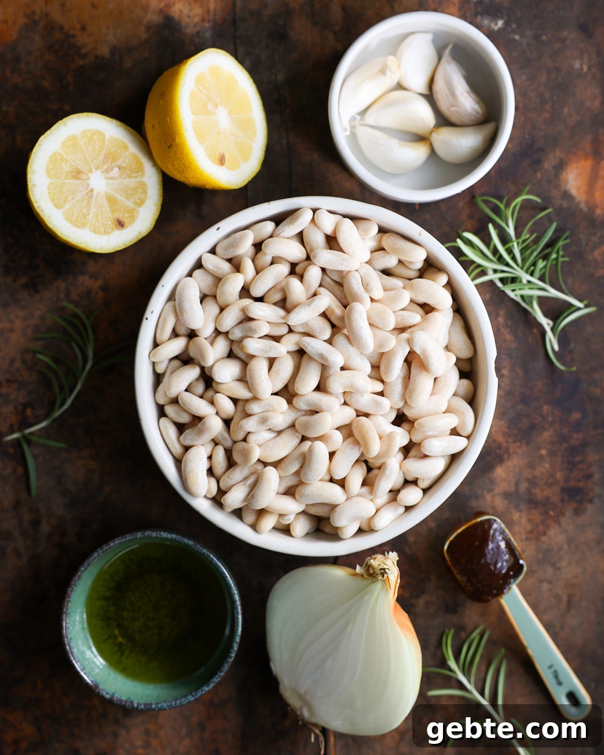 Creamy Instant Pot White Beans with Lemon and Rosemary 3 An overhead shot of the ingredients to make Instant Pot White Beans.