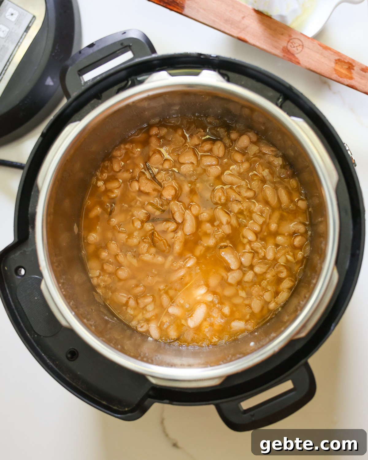 Creamy Instant Pot White Beans with Lemon and Rosemary 7 Cooked creamy white beans in the Instant Pot.