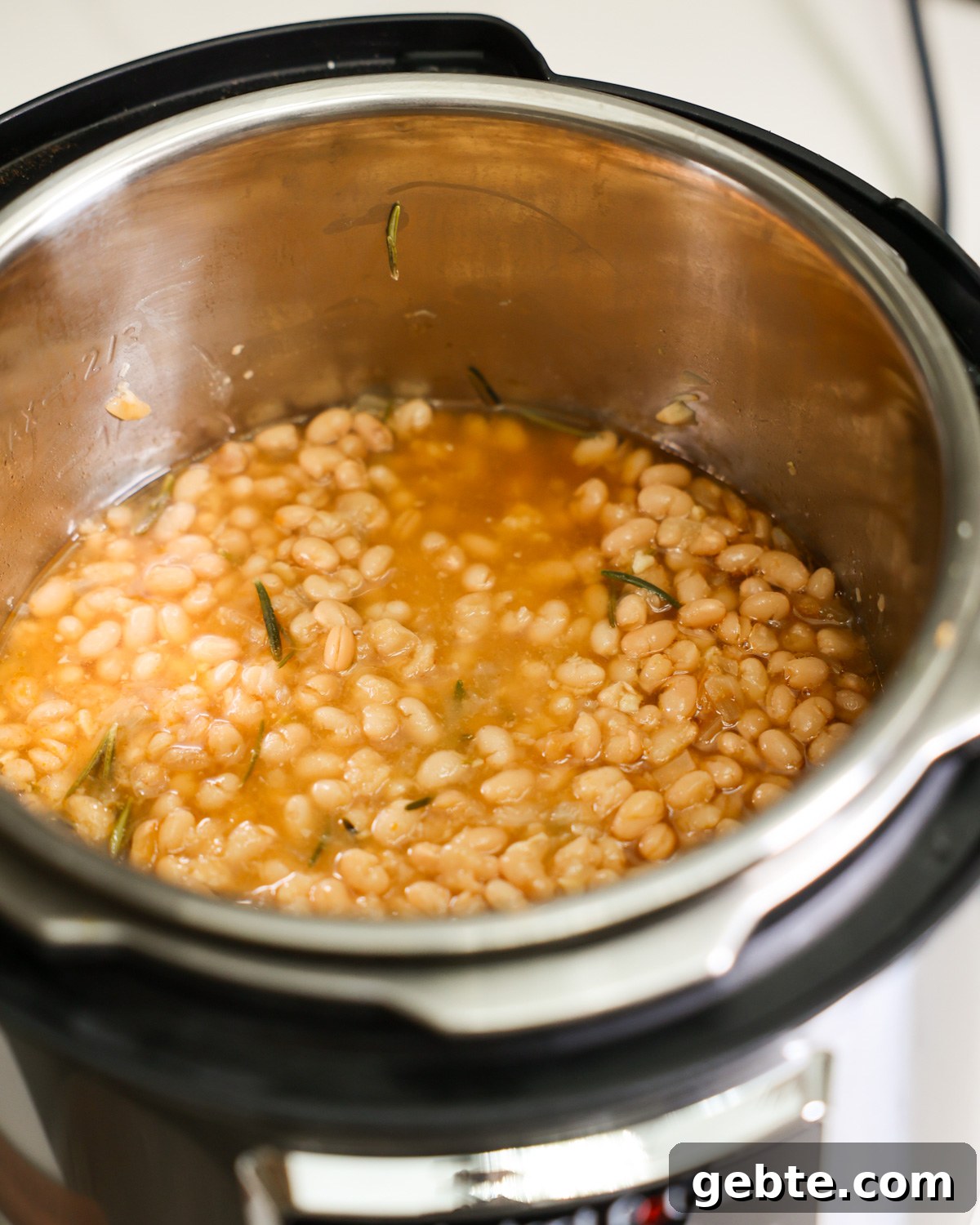 Creamy Instant Pot White Beans with Lemon and Rosemary 8 Creamy cooked white beans in the Instant Pot.