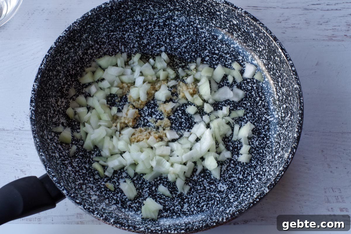 onion and garlic in skillet with olive oil