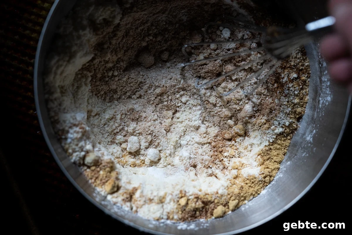 The almond flour and gingerbread spice mix in a metal bowl