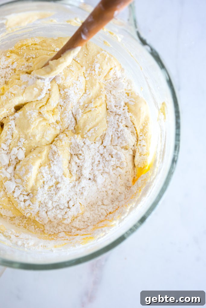 Nectarine and Crème with Pink Peppercorn Honey Cake Recipe 9 Folding batter for Pink Peppercorn Honey Cake