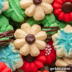 Pile of decorated buttery classic spritz cookies.