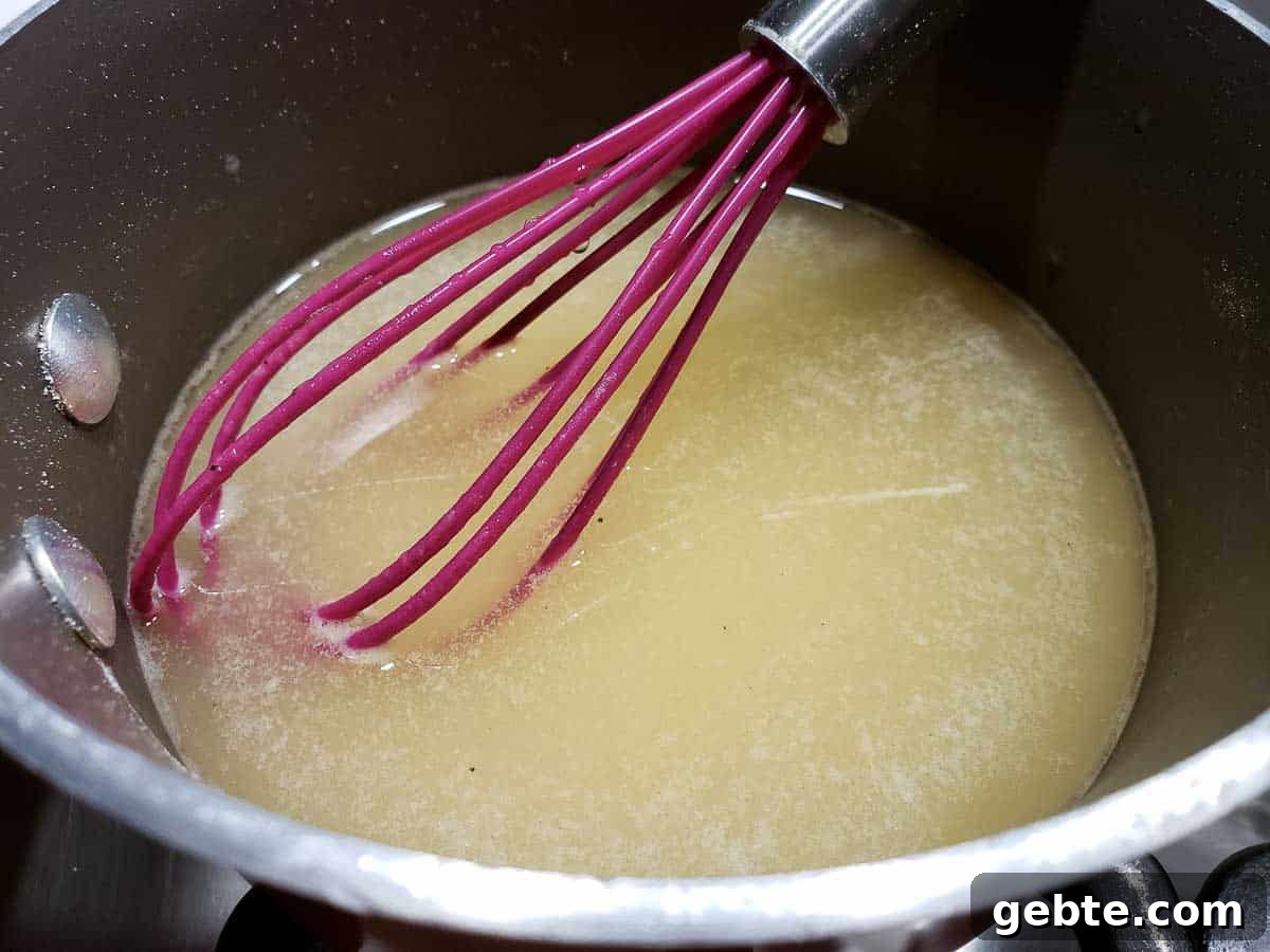 Simple 3-Ingredient Chicken Gravy Made from Scratch 4 chicken gravy from scratch in a sauce pan