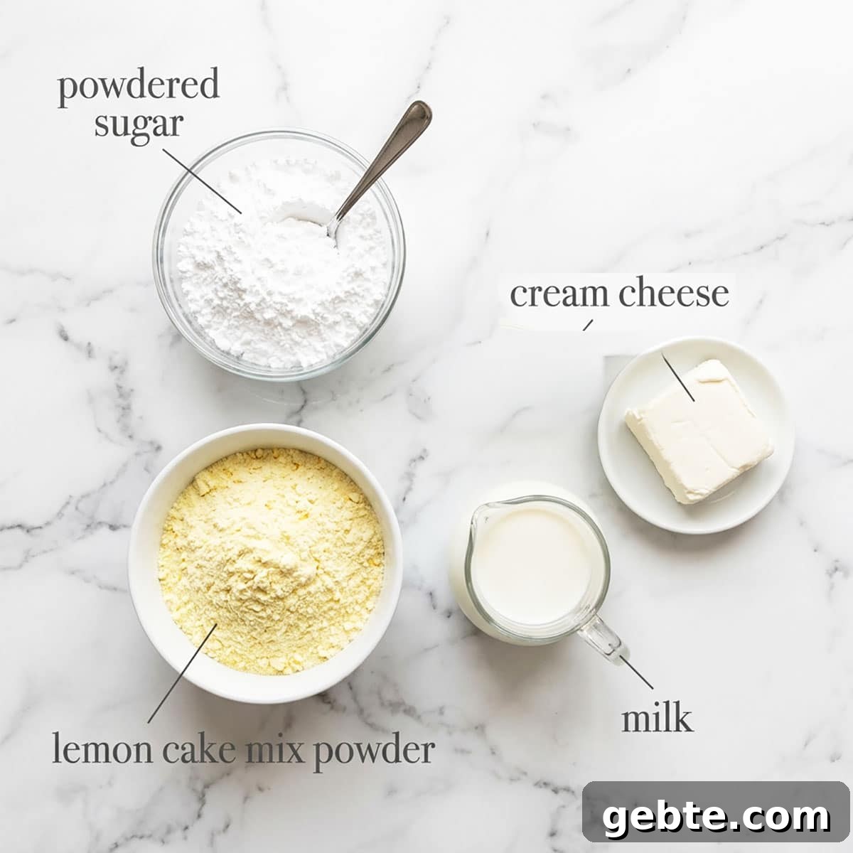 Lemon Cake Truffles: Zesty Bite-Sized Dessert Recipe 3 Ingredients for recipe on white marble background- cream cheese, powdered sugar, milk, cake mix.