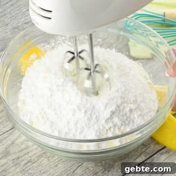 Lemon Cake Truffles: Zesty Bite-Sized Dessert Recipe 4 Ingredients added to glass bowl ready to be mixed.