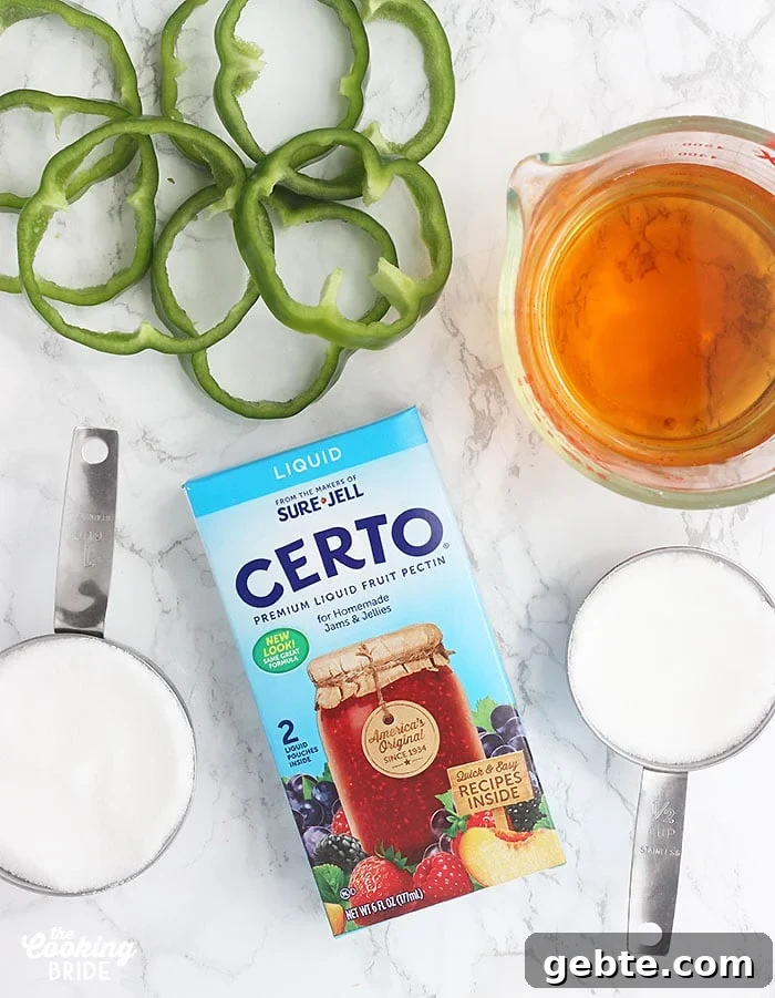 Certo liquid pectin laying on a marble surface surrounded by pepper slices, vinegar, and sugar