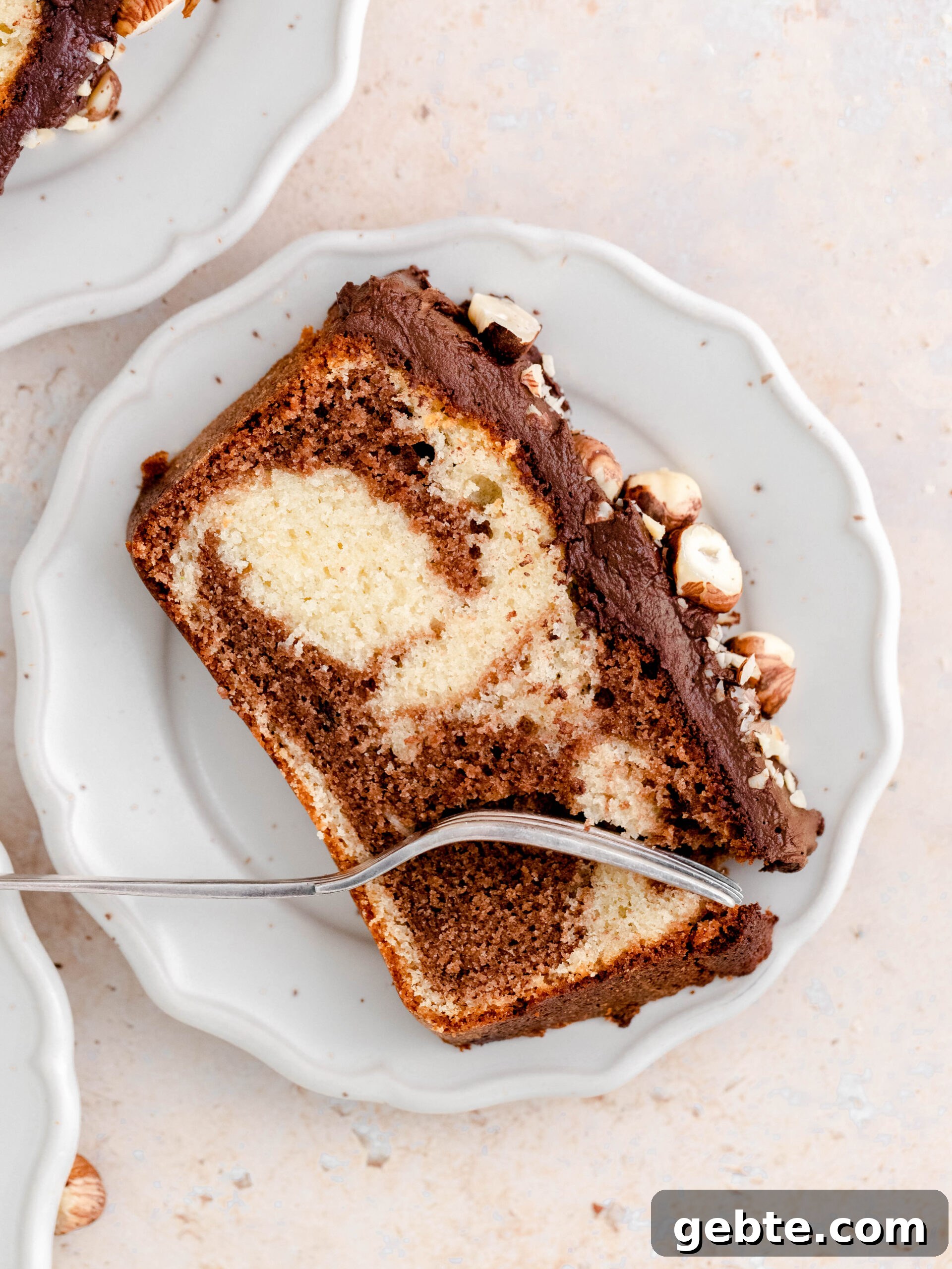 A slice of Nutella loaf cake on a plate.