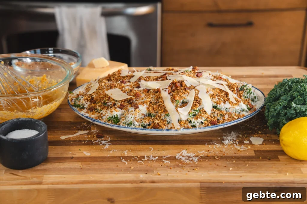 Viral Kale Caesar Salad for Quick Weeknight Dinners 8 Viral kale salad with caesar dressing on a white platter.