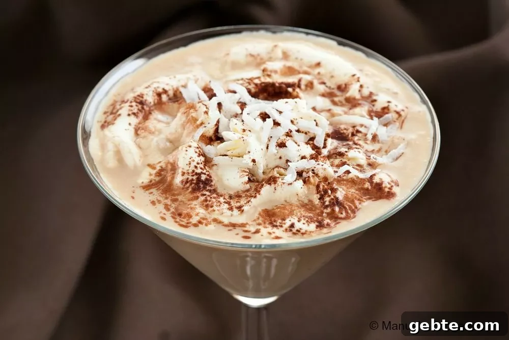 Sweet Dreams Cocktail in a martini glass – an easy Baileys and Kahlua cocktail recipe for festive occasions.