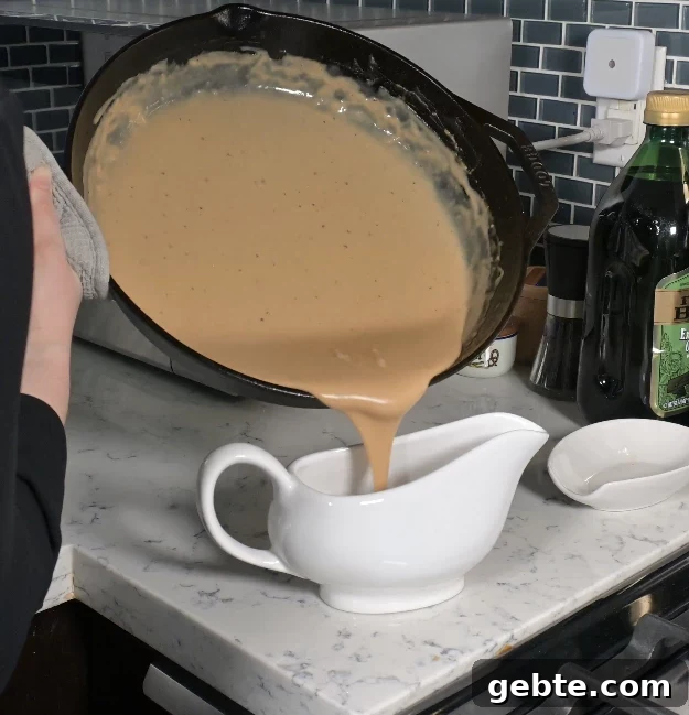 Authentic Swedish Köttbullar Recipe: Classic Meatballs with Creamy Gravy 22 Transferring the gravy.