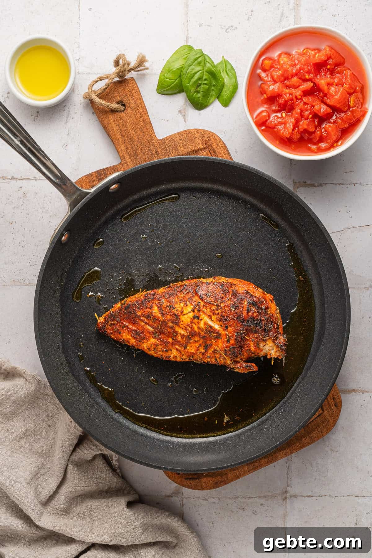 Creamy Vodka Penne with Grilled Chicken and Parmesan 6 Searing chicken in a skillet.