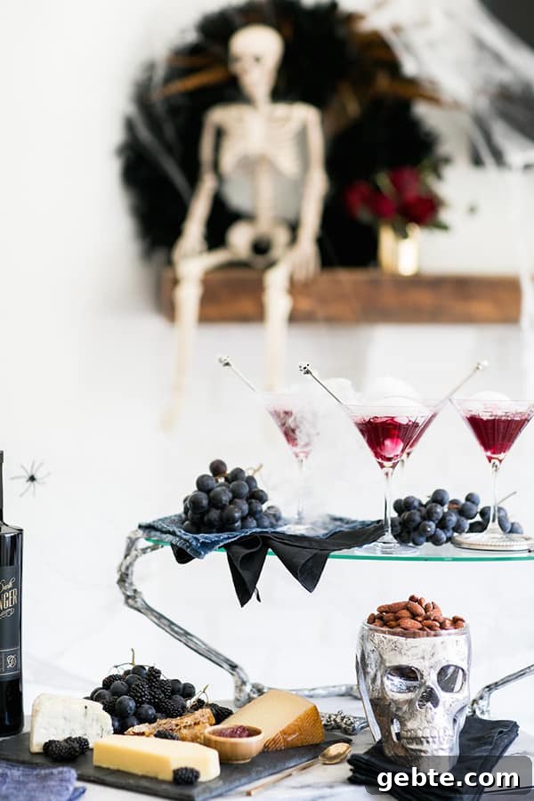 Three blueberry cocktails on a table