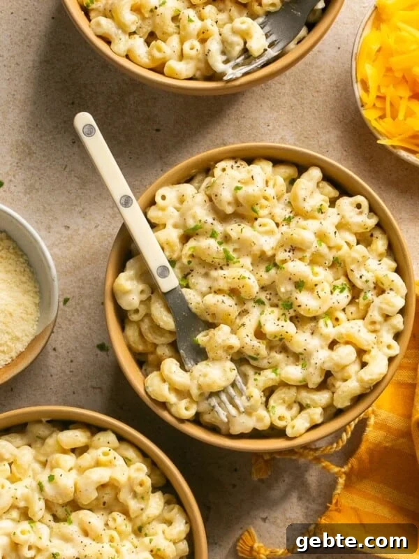 Protein-Packed Cottage Cheese Flatbread (Gluten-Free, Flourless) 12 protein mac and cheese in a bowl with a fork