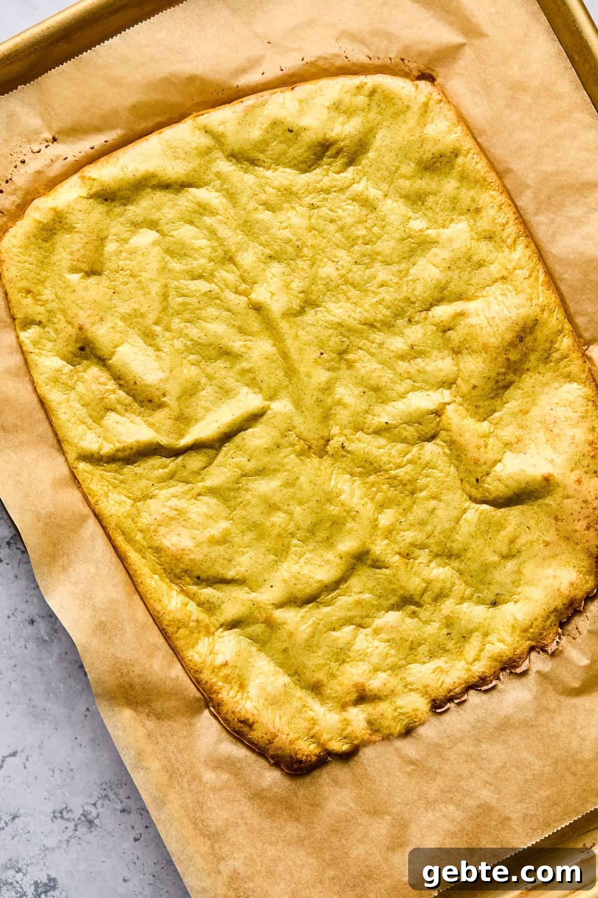 Protein-Packed Cottage Cheese Flatbread (Gluten-Free, Flourless) 7 baked cottage cheese flatbread on a baking sheet
