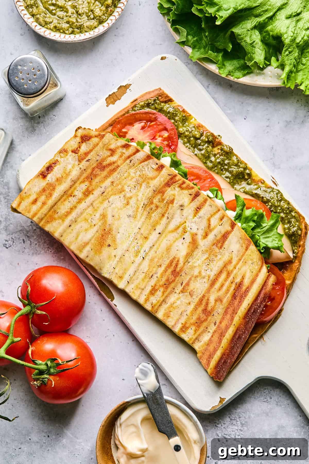 Protein-Packed Cottage Cheese Flatbread (Gluten-Free, Flourless) 8 cottage cheese flatbread stuffed with fillings on a cutting board