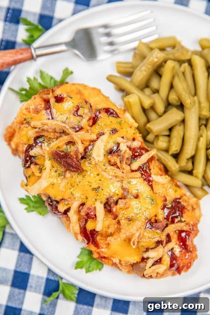 Crispy Oven-Baked BBQ Chicken Recipe for Perfectly Juicy Meat 4 cheesy bbq chicken on a plate