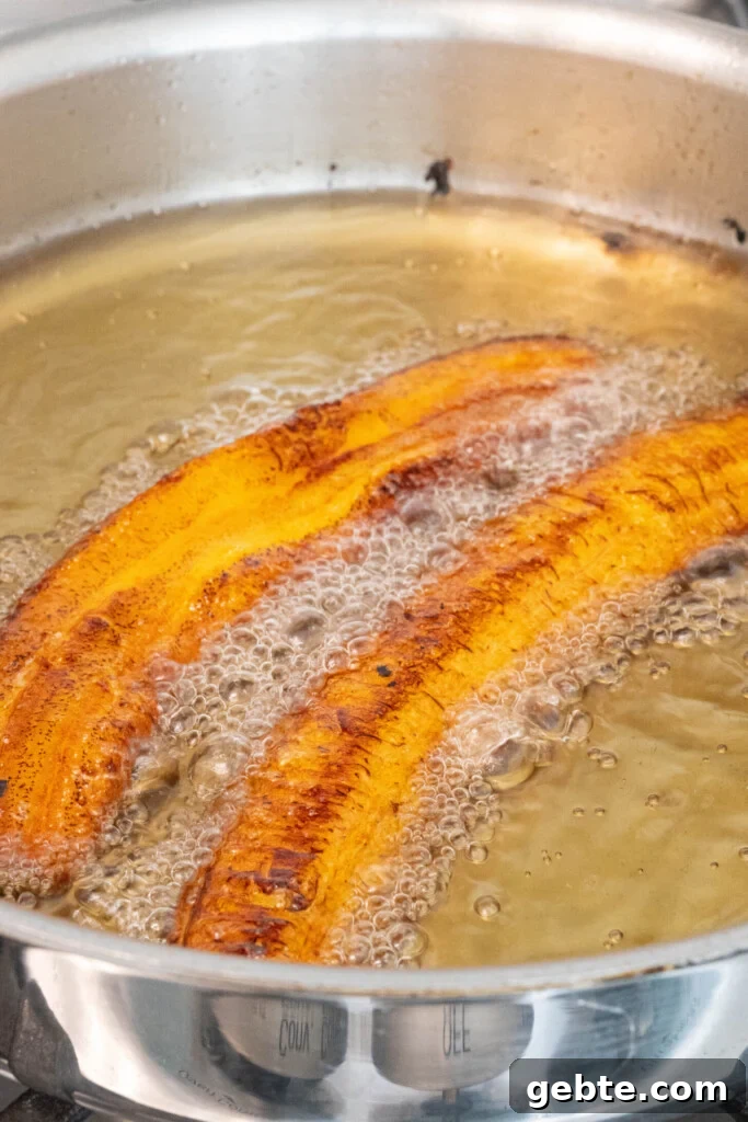 Authentic Puerto Rican Piononos: Savory Plantain Cups Recipe 6 plantains frying in oil