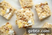 A few cut sweet and salty rice Krispy treats stacked in the middle.