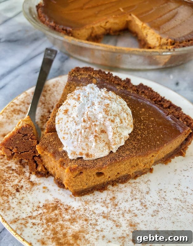 slice of vegan pumpkin pie on a plate slice of vegan pumpkin pie on a plate