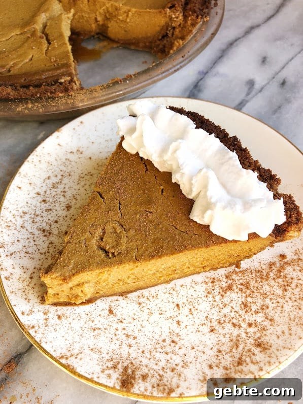 slice of vegan pumpkin pie on a plate slice of vegan pumpkin pie on a plate