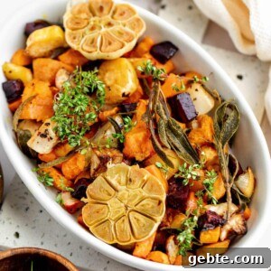 roasted root vegetables in a white casserole dish